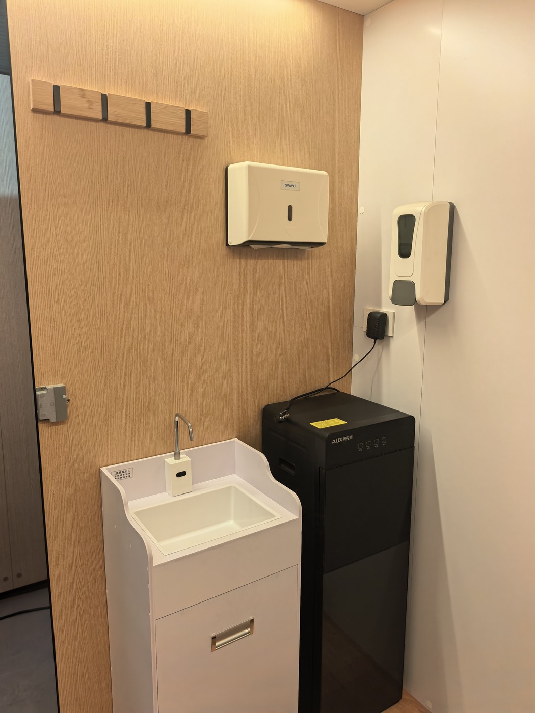 Mobile sensor-activated sink, no-rinse sanitiser dispenser, wall tissue box and foldable hooks